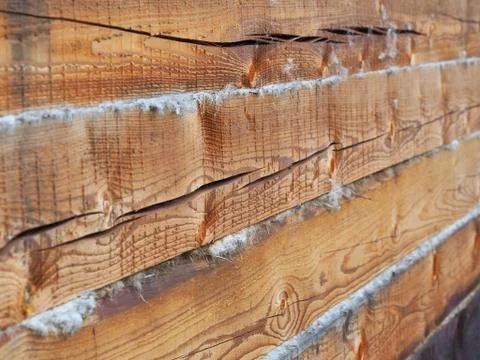 External wall made of pine timber with seams sealed with insulation Stock Photos