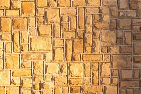 External yellow stone wall background Stock Photos
