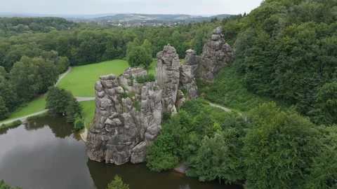 Externsteine Rocks Reflected Beside The River Vídeo Stock 339367479