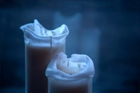 Extinct candles in blue Stock Photos