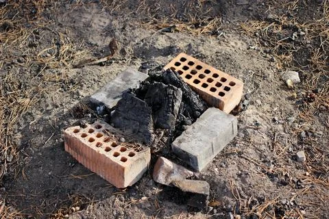Extinct coals in a barbecue made of bricks Stock Photos