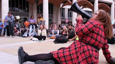 “Extinction… Rebellion” Chant over megaphone at XR Blood Money Protest Stock Footage 160151053