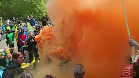 Extinction Rebellion climate activists blocking the road during protest action 스톡 동영상 242277288