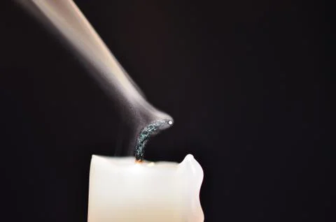 Extinguished candle Stock Photos