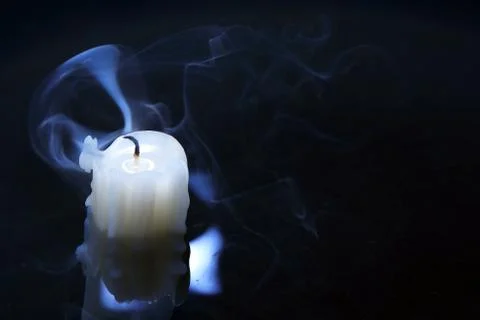 Extinguished candle Stock Photos