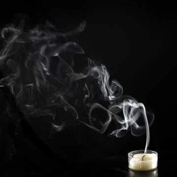 Extinguished candle with smoke Foto stock