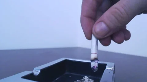 Extinguished cigarette in ashtray Stock Footage 41894708