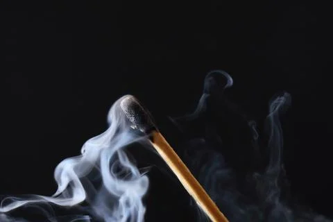 Extinguished Match On Dark Stock Photos