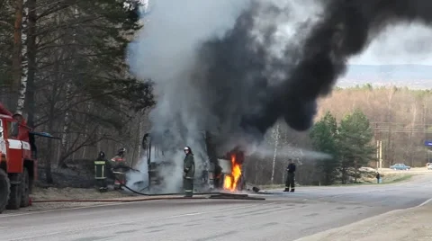 Extinguishing of the burning bus Stock Footage 4852043
