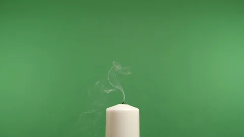 Extinguishing a candle Stock Footage 103047841