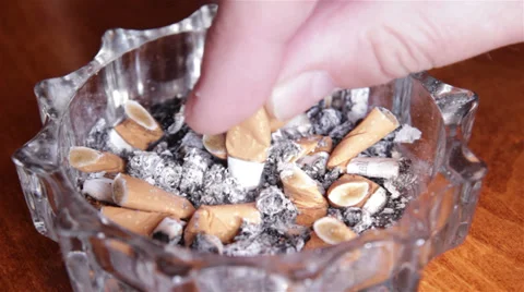 Extinguishing Cigarette Full Ashtray Stock Footage 37646008