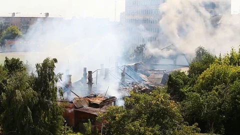 Extinguishing a fire at a distance from the elevation view from afar Stock-Footage 79501880