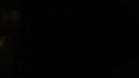 Extinguishing a fire at night. The work of firefighters in difficult conditions. Stock Footage 157910128