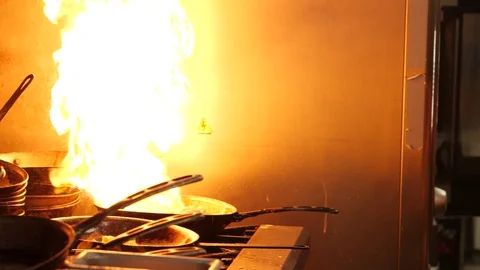 Extinguishing the fire on the pan Stock Footage 127601811