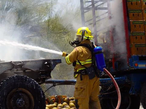 Extinguishing the Fire Stock Photos