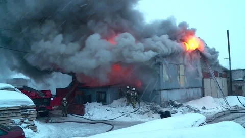Extinguishing fire in the warehouse. Smoke. Fire. Stock Footage 72912436