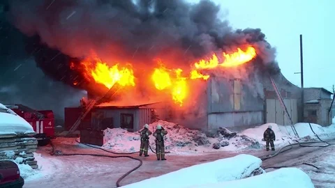 Extinguishing fire in the warehouse. Smoke. Fire. Stock Footage 72913086