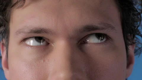 Extpeme closeup pensive man raising eyes thinking brainstorming solving problem Stock Footage 192500366