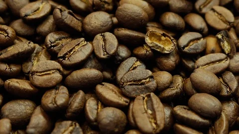 Extra close-up of fragrant roasted dark coffee beans Stock Footage 123358751