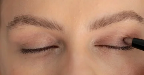 Extra close up of professional make up applying eye shadows with pencil  Stock Footage 90929153