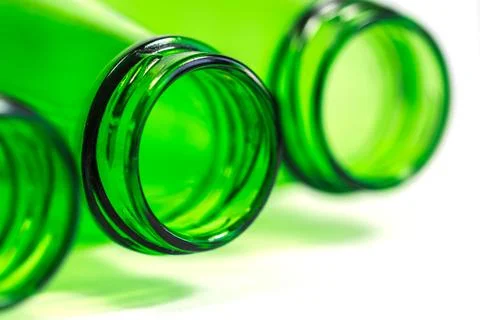 Extra Closeup of Green Bottles on white background with focus on center Bottle Stock Photos