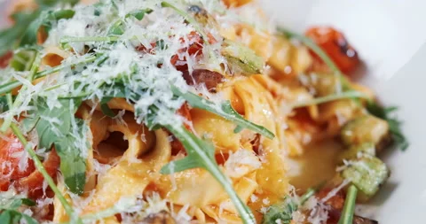 Extra delicious pasta cooked and served on plate, made by professional chef Stock Footage 133392540