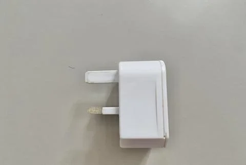 Extra plug extension on the table Stock Photos