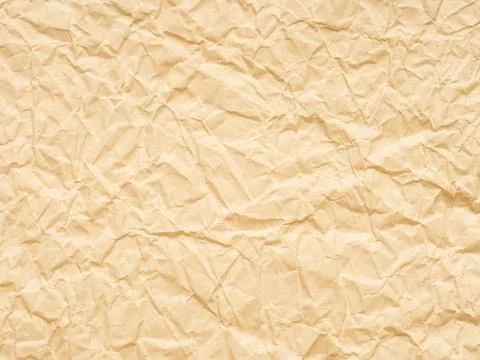 Extra soft beige or yellow crumpled paper texture. Blank grunge page or sheet Stock Photos