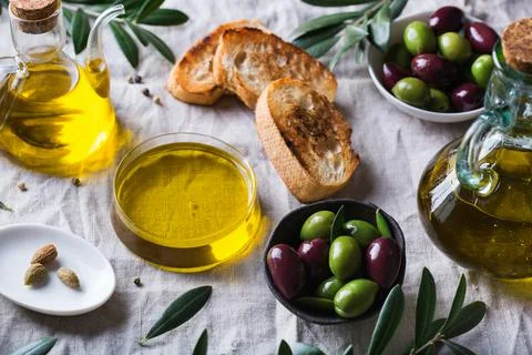 Extra virgin olive oil on a table Stock Photos