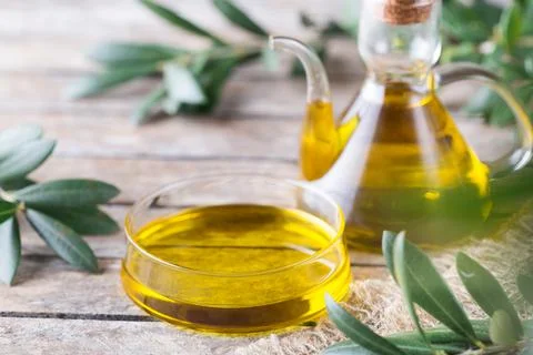 Extra virgin olive oil on a table Stock Photos
