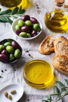 Extra virgin olive oil on a table Stock Photos