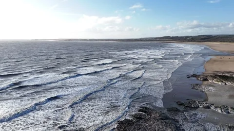 Extra Wide Drone Tracking Forward Over Rocky Coast and Waves, UK 4K Stock-Footage 334071102