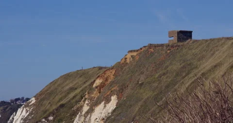 Extra wide shot looking over the white cliffs of Dover to a World War Two Stock Footage 331152610