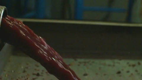 Extracted grape juice pouring on strainer Stock Footage 87808282