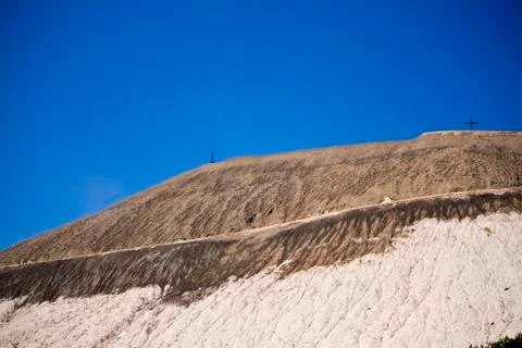 Extracting and mining potassium and magnesium salts.Large excavator machine and Stock Photos