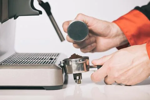 Extracting coffee and making several hot drinks in studio Stock Photos