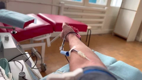 Extraction of blood from a vein using a needle Stock Footage 294971759