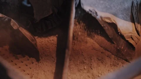 Extraction of clay. The solution is poured into a storage tank and mixed. Stock Footage 316320934