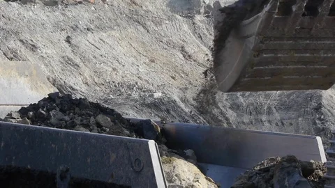 Extraction of coal in a quarry by an excavator Stock Footage 81263274