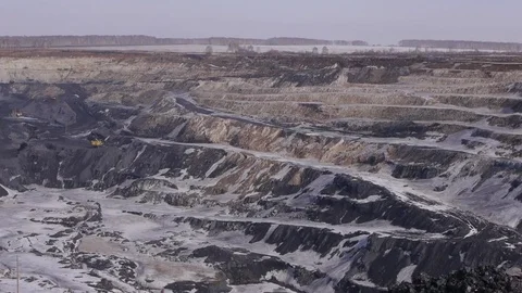 Extraction of coal in a quarry by an excavator Stock Footage 81263286