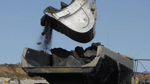 Extraction of coal in a quarry by an excavator Stock Footage 81263290