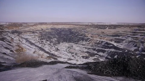Extraction of coal in a quarry by an excavator Stock Footage 81263312