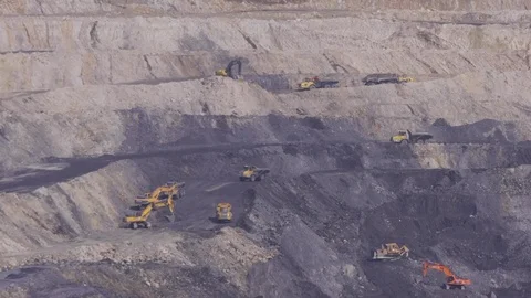 Extraction of coal in a quarry by an excavator Stock Footage 81263320