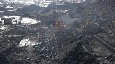 Extraction of coal in a quarry by an excavator Stock Footage 81263329
