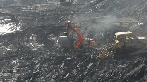 Extraction of coal in a quarry by an excavator Stock Footage 81263340