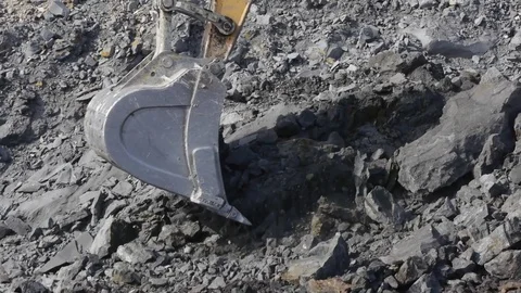 Extraction of coal in a quarry by an excavator Stock Footage 81263343