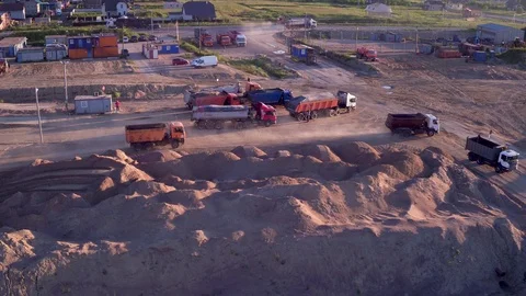 Extraction of construction sand at the quarry. Loading construction sand in Stock Footage 104104884