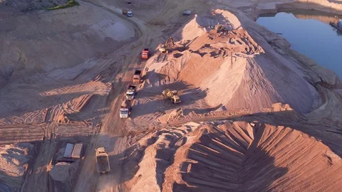 Extraction of construction sand at the quarry. Loading construction sand in Stock Footage 105268271