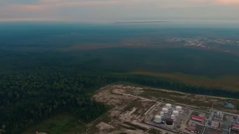 Extraction of heavy hydrocarbons is harmful to the environment. The drone flies Stock Footage 162692566