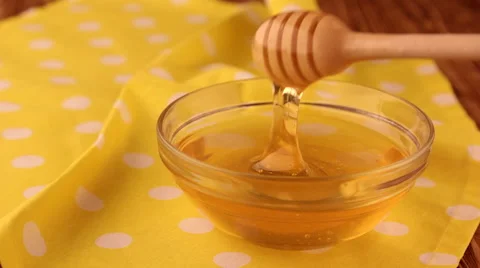 Extraction honey with a dipper, Honey is a source of health, Stock Footage 65165903